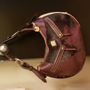 Dooney & Bourke large circle hobo with cow hide fur